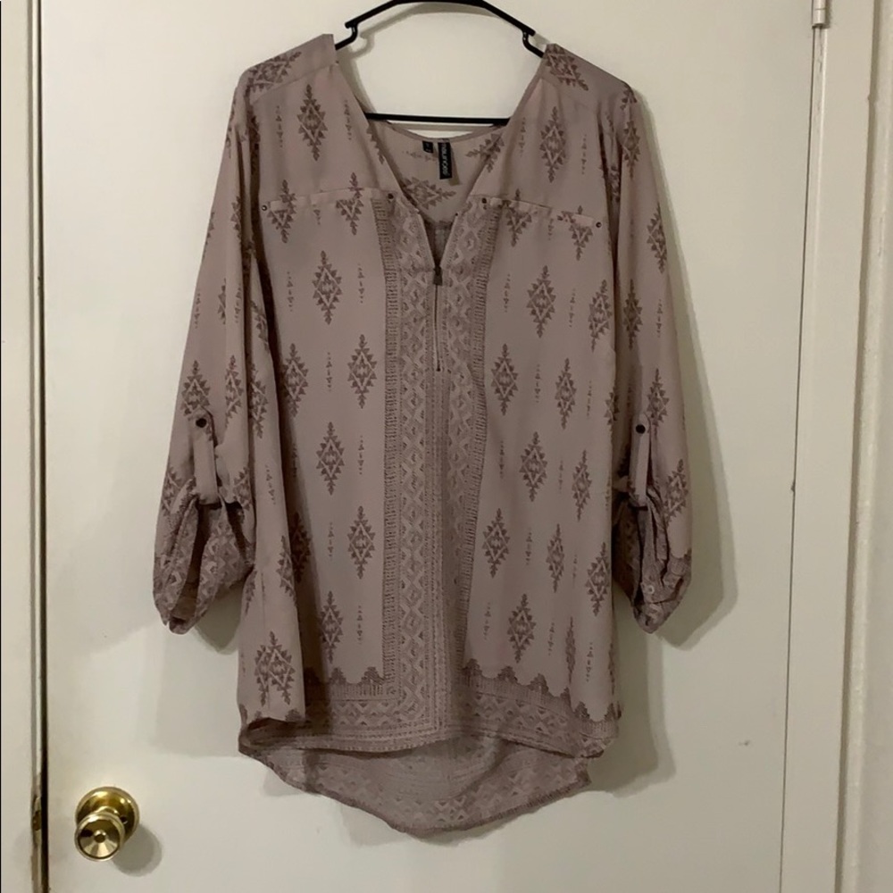Maurice’s light colored mauve blouse